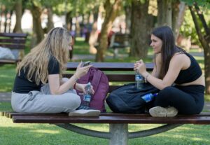 girls, friends, casual, smartphone, relaxing, talking, bench, parka, nature, naturally, trees, autumn